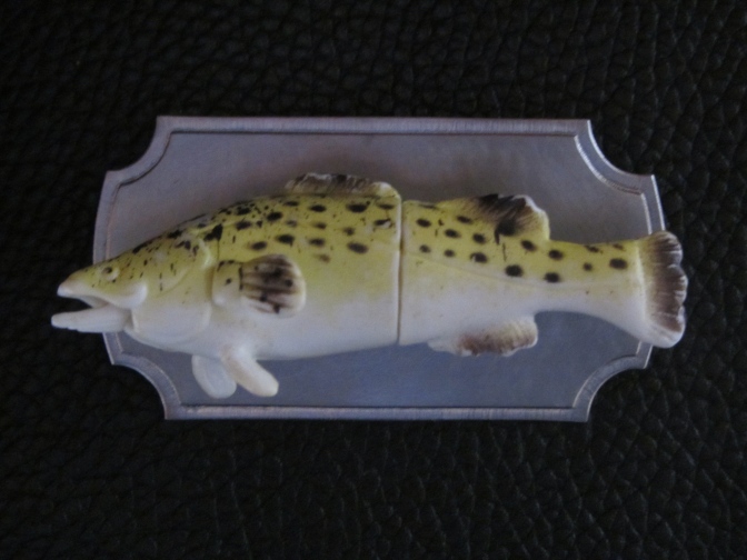 Ginger Bottari, Trophy Fish brooch, saw pierced titanium, collected object